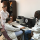 (From left) Lorraine Chishimba, Alison Navis (a visting American, Deanna Saylor and Stanley Zimba examine CT scans of UTH patients